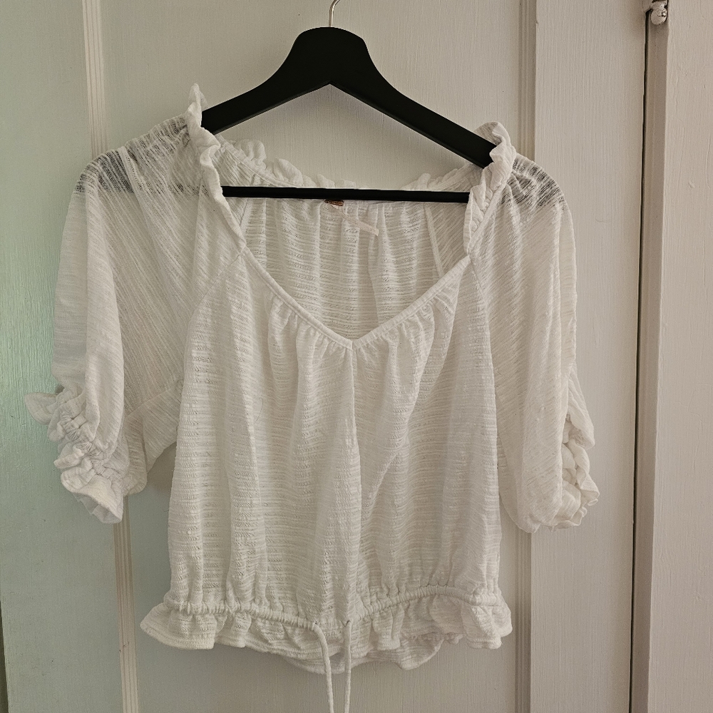 Free People white ruffled blouse | Size medium